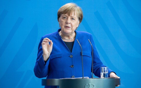 epa08373374 German Chancellor Angela Merkel gives a statement after a Corona Cabinet Meeting in Berlin, Germany, 20 April 2020. Countries around the world are taking increased measures to stem the wid ...