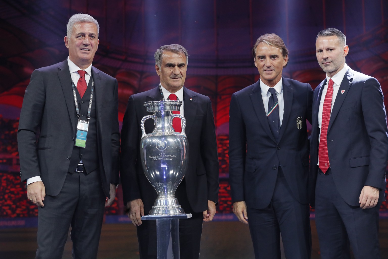 epa08035959 (L-R) Head coach of Switzerland Vladimir Petkovic, head coach of Turkey Senol Gunes, head coach of Italy Roberto Mancini and head coach of Wales Ryan Giggs during the UEFA EURO 2020 final  ...