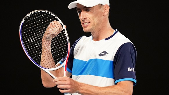 epa08159219 John Millman of Australia reacts during his third round match against Roger Federer of Switzerland on day five of the Australian Open tennis tournament at Rod Laver Arena in Melbourne, Aus ...