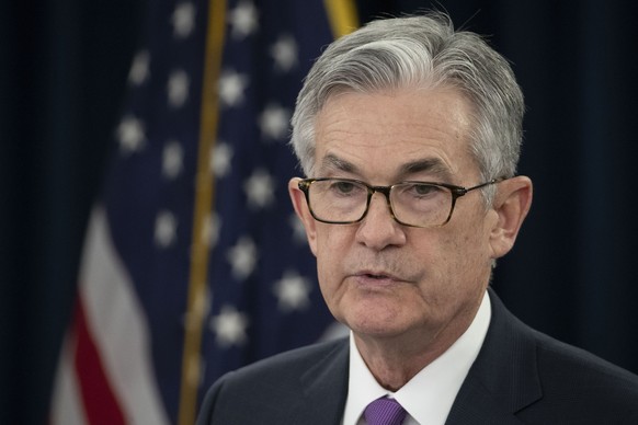 FILE - In this Jan. 30, 2019, file photo, Federal Reserve Chairman Jerome Powell speaks at a news conference in Washington. Powell says political attacks by President Donald Trump played no role in th ...