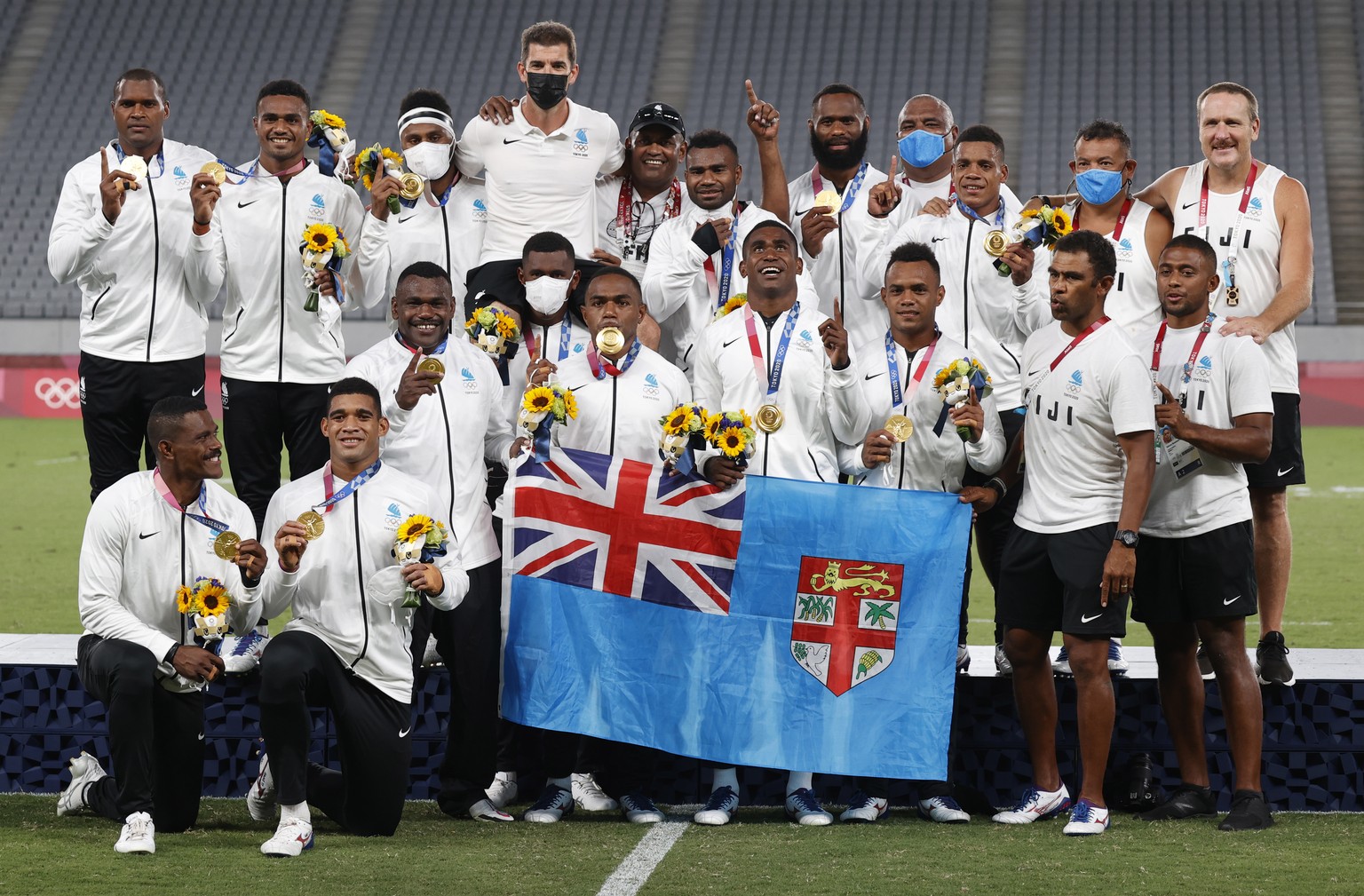 epa09373395 Men&#039;s Rugby Sevens Gold medalist Fiji celebrates at the podium at the Tokyo 2020 Olympic Games at the Tokyo Stadium in Chofu, Tokyo, Japan, 28 July 2021. EPA/JEON HEON-KYUN