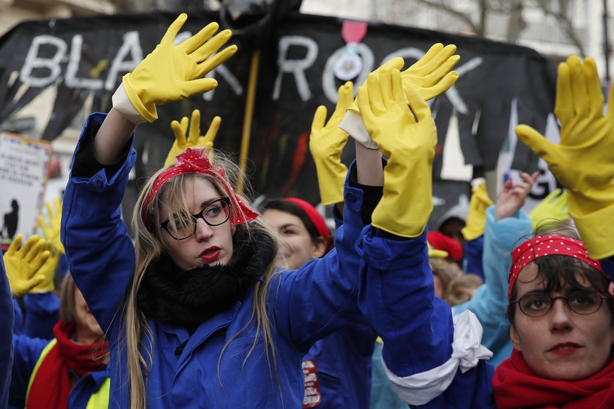 Women sing against French President Emmanuel Macron during a demonstration Saturday, Jan. 11, 2020 in Paris. The French government and labor unions appeared far from reaching any compromise deal Frida ...