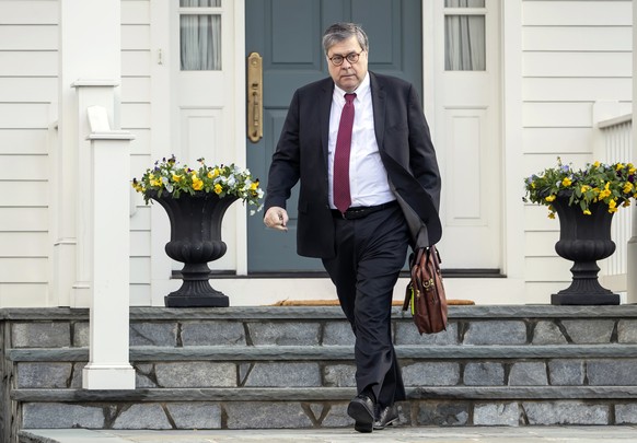epa07873324 (FILE) - US Attorney General William Barr leaves his home in McLean, Virginia, USA, 22 March 2019 (reissued 27 September 2019). An impeachment inquiry against US President Donald J. Trump  ...