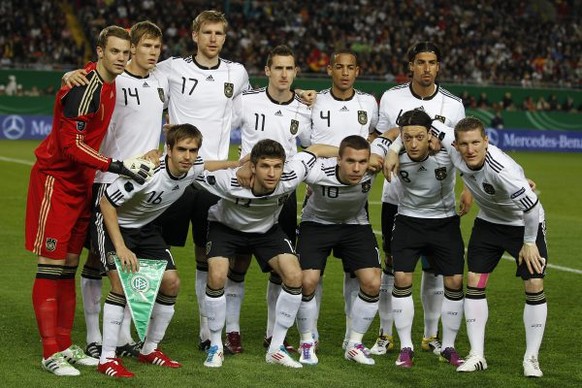 Germany&#039;s, rear from left, Manuel Neuer, Holger Badstuber, Per Mertesacker, Miroslav Klose, Dennis Aogo, Samy Khedira and front from left, Philipp Lahm, Thomas Mueller, Lukas Podolski, Mesut Oezi ...