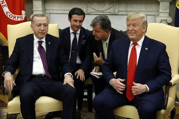 President Donald Trump and Turkish President Recep Tayyip Erdogan meet in the Oval Office with Republican senators at the White House Wednesday, Nov. 13, 2019, in Washington. (AP Photo/Patrick Semansk ...