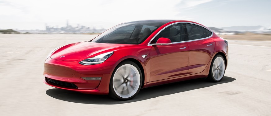 This undated photo provided by Tesla shows the 2019 Model 3. The Model 3 is the most affordable and fun-to-drive Tesla that you can buy right now. In many ways the Model 3 also betters established lux ...