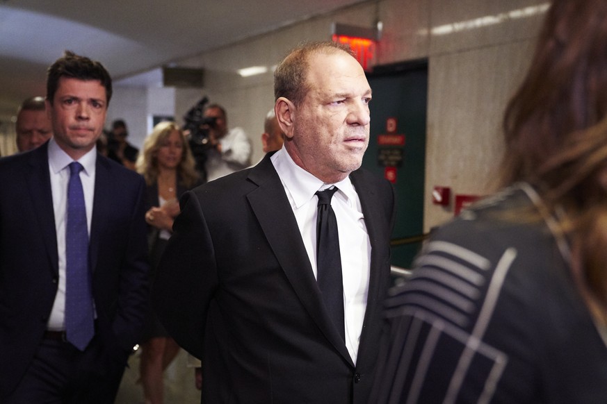 epa07795310 Disgraced movie producer Harvey Weinstein (R) arrives to New York State Supreme Court for a hearing related to his upcoming trial on charges of rape and sexual assault in New York, New Yor ...