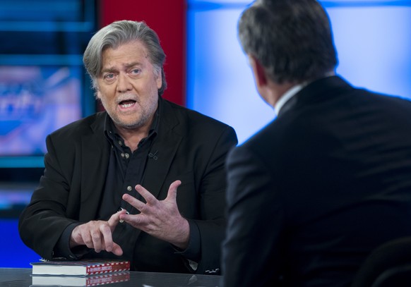 Former White House strategist Steve Bannon, left, takes part in an interview with host Sean Hannity on the set of Fox News Channel&#039;s Hannity in New York, Monday, Oct 9, 2017. (AP Photo/Craig Rutt ...