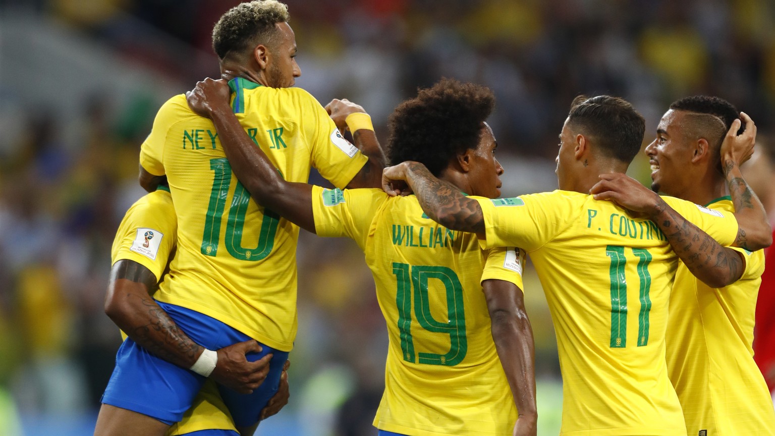 Brazil players celebrates after their teammate Brazil&#039;s Paulinho, left, scores his side&#039;s first goal during the group E match between Serbia and Brazil, at the 2018 soccer World Cup in the S ...