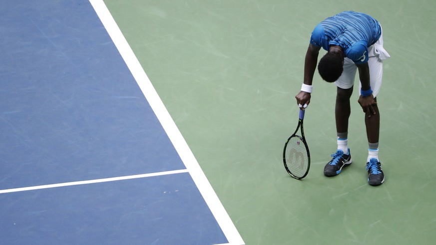 Gael Monfils, of France, reacts after a point to Novak Djokovic, of Serbia, during the semifinals of the U.S. Open tennis tournament, Friday, Sept. 9, 2016, in New York. (AP Photo/Seth Wenig)