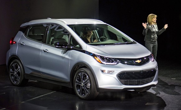 epa05090610 A handout picture released by Chevrolet of General Motors (GM) Chairman and CEO Mary Barra introducing the 2017 Chevrolet Bolt EV at its world debut during the Consumer Electronics Show (C ...