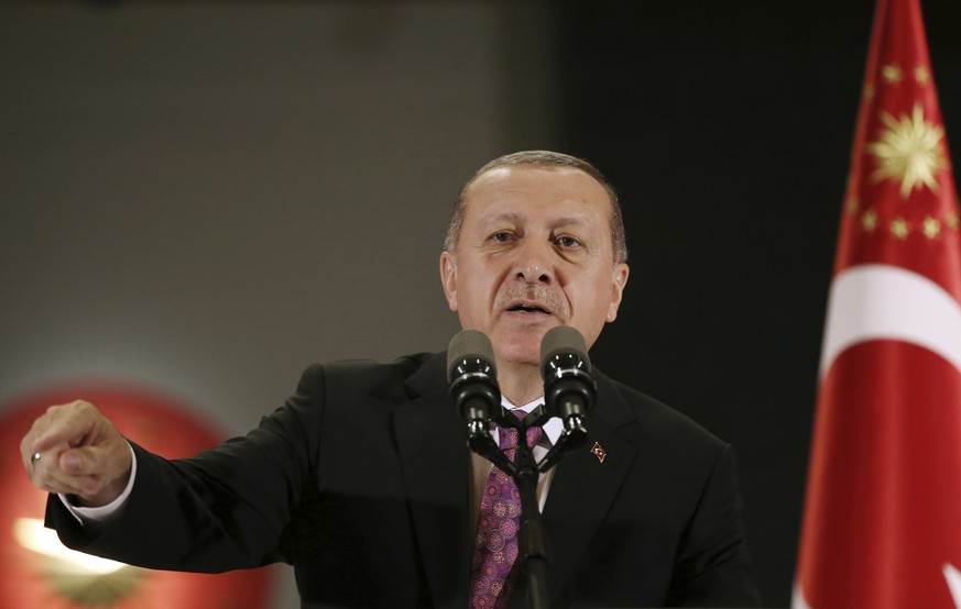 Turkey&#039;s President Recep Tayyip Erdogan addresses his guests before an Iftar dinner to break the day&#039;s fasting during the Muslim holy month of Ramadan, in Ankara, Turkey, Wednesday, June 20, ...
