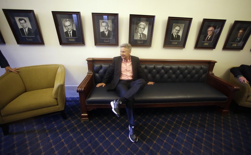 FILE - In this May 18, 2016 file photo, Libertarian presidential candidate, former New Mexico Gov. Gary Johnson waits to speak with legislators at the Utah State Capitol in Salt Lake City. He has virt ...