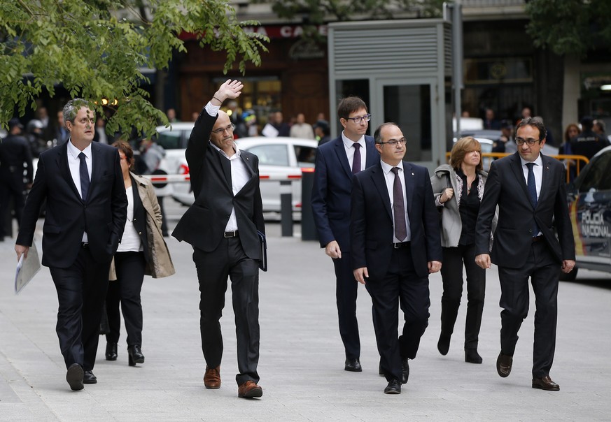 Fired Catalan Cabinet members arrive at the national court in Madrid, Spain, Thursday, Nov. 2, 2017. From left to right are, Joaquim Forn, Dolors Bassa i Coll, Raul Romeva, Carles Mundo, Jordi Turull, ...
