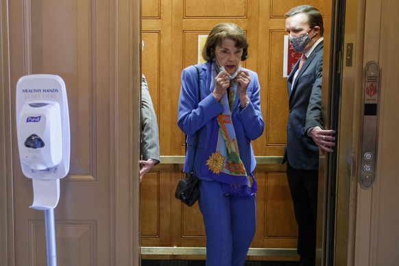 epa08420230 Democratic Senator from California Diane Feinstein walks to the Senate floor for a vote during the COVID-19 coronavirus pandemic at the US Capitol in Washington, DC, USA, 13 May 2020. Repu ...
