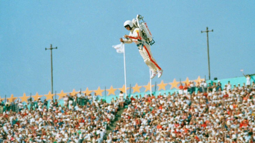 FILE - In this July 28, 1984 file photo Bill Suiter &quot;Rocket Man&quot; soars with the help of a jet pack during the welcoming of nations at the Opening ceremonies of the 1984 Summer Olympics in th ...