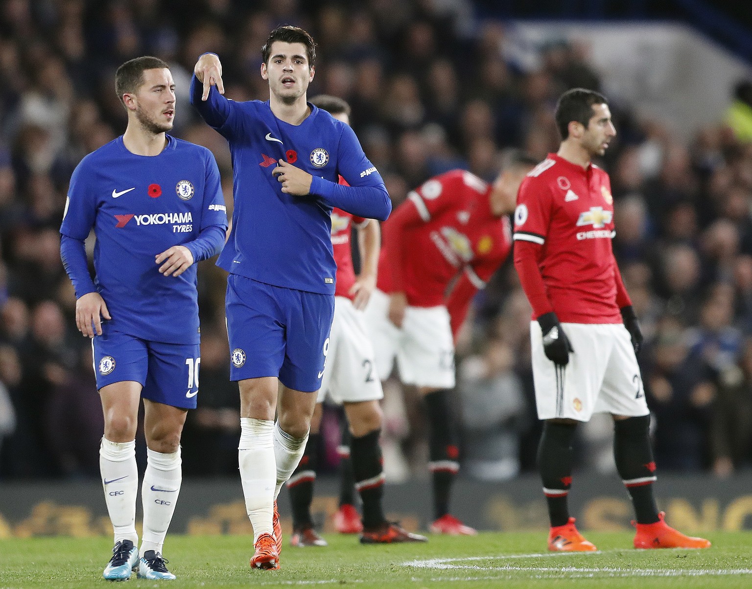 Chelsea&#039;s Alvaro Morata and Chelsea&#039;s Eden Hazard, left, celebrate after scoring during the English Premier League soccer match between Chelsea and Manchester United at Stamford Bridge stadi ...