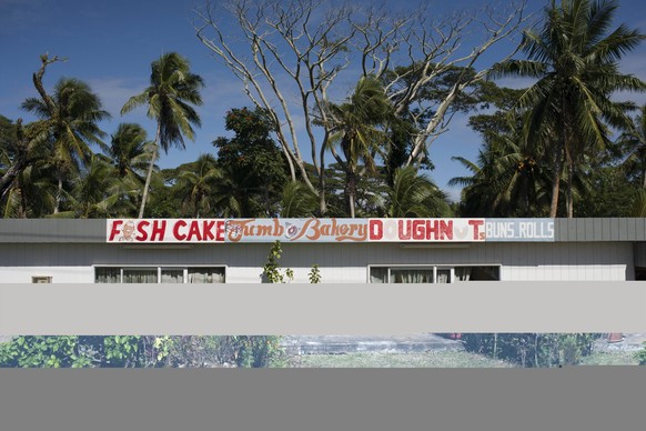 Fish Cake Bakery shop in Atiu Island. Cook Island. Polynesia. South Pacific Ocean. Shopping on Atiu is limited to the small number of general stores and their basic food supplies. All shops are closed ...