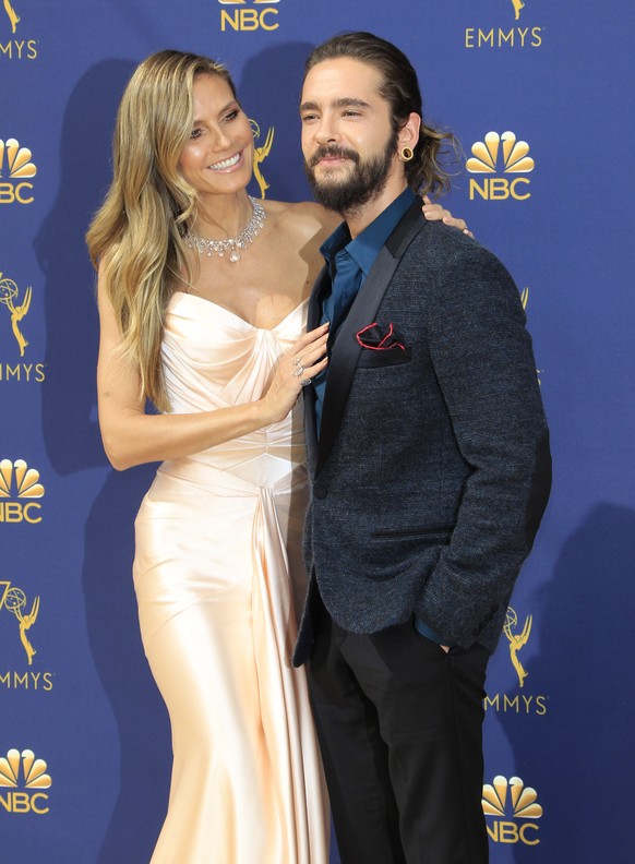 epa07028294 Heidi Klum (L) and Tom Kaulitz (R) arrive for the 70th annual Primetime Emmy Awards ceremony held at the Microsoft Theater in Los Angeles, California, USA, 17 September 2018. The Primetime ...