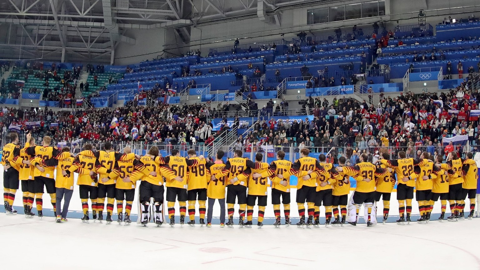 epa06563408 Silver medalists of Team Germany stand in line during the medal ceremony after the Men&#039;s Ice Hockey Gold Medal Game between the Olympic Athlete from Russia (OAR) and Germany at the Ga ...
