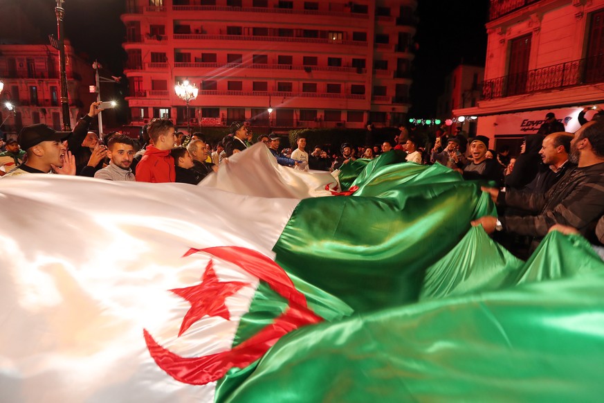 epa07481251 Algerian people celebrate on the streets after Algeria&#039;s President Abdelaziz Bouteflika has submitted his resignation, in Algiers, Algeria, 02 April 2019. According to official media  ...