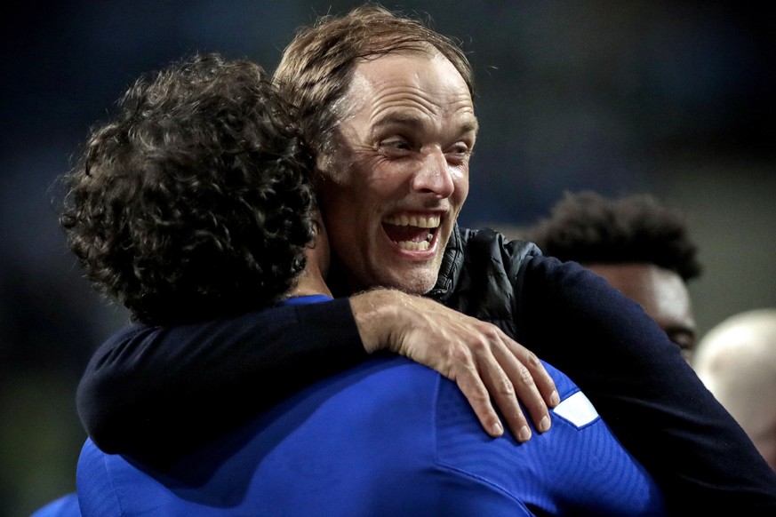 epa09236220 Chelsea&#039;s manager Thomas Tuchel (R) celebrates after winning the UEFA Champions League final between Manchester City and Chelsea FC in Porto, Portugal, 29 May 2021. EPA/Manu Fernandez ...