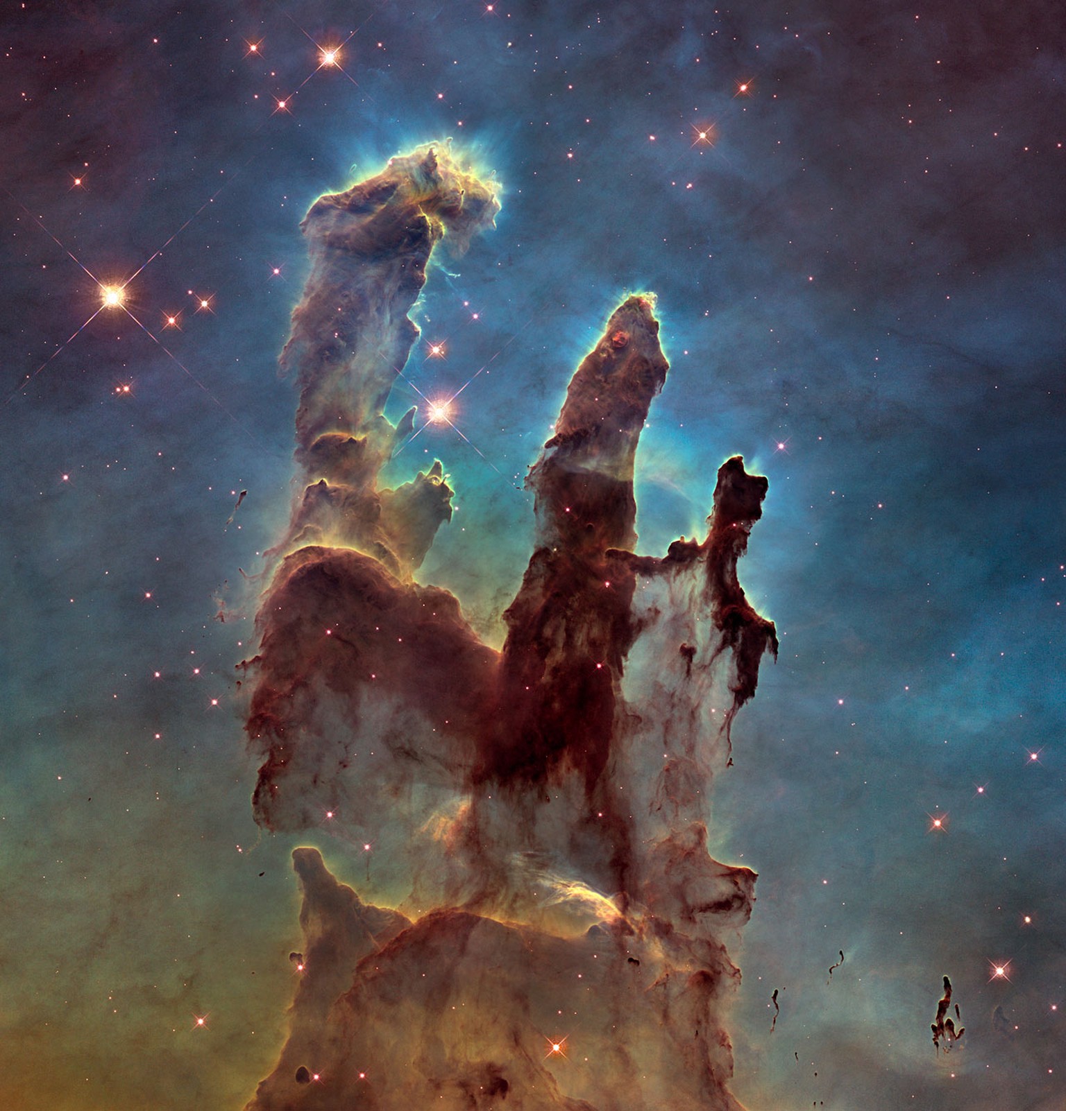The NASA/ESA Hubble Space Telescope has revisited one of its most iconic and popular images: the Eagle Nebula’s Pillars of Creation. This image shows the pillars as seen in visible light, capturing th ...