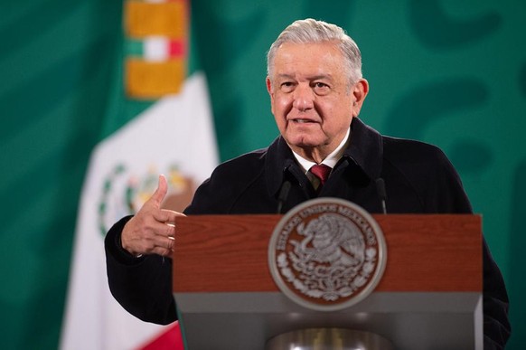 epa08924921 A handout photo made available by the Mexican Presidency shows Head of State of Mexico, Andres Manuel Lopez Obrador, who speaks during his press conference at the National Palace, in Mexic ...
