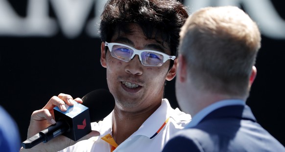 South Korea&#039;s Chung Hyeon is interviewed by former champion Jim Courier following his quarterfinal win over United States&#039; Tennys Sandgren at the Australian Open tennis championships in Melb ...