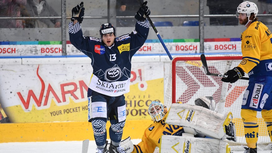 Ambri&#039;s player Marco Mueller celebrates the 3-3 during the regular season game of National League Swiss Championship 2017/18 between HC Ambri Piotta and HC Davos, at the ice stadium Valascia in A ...