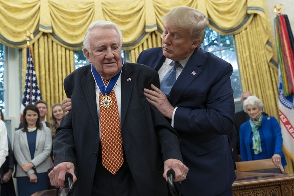 epa07906393 US President Donald J. Trump presents the Presidential Medal of Freedom to Edwin Meese at the White House in Washington, DC, USA, 08 October 2019. Meese, 87, served as the Attorney General ...