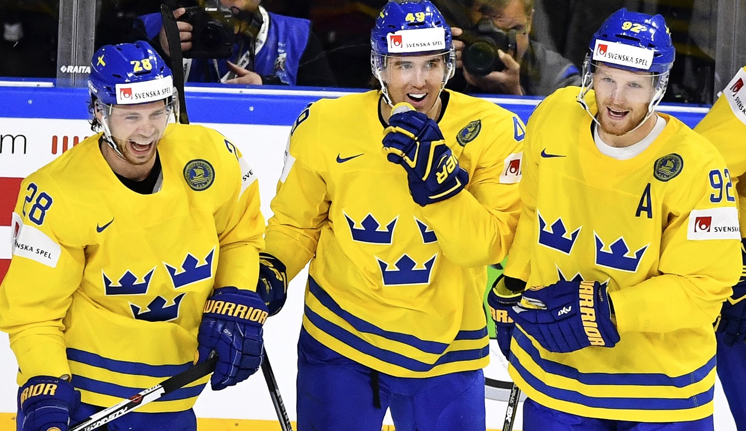 epa05959314 Sweden&#039;s forward Victor Rask (C) celebrates with his teammates Elias Lindholm (L) and Gabriel Landeskog (R) after scoring the 1-0 lead during the 2017 IIHF Ice Hockey World Championsh ...