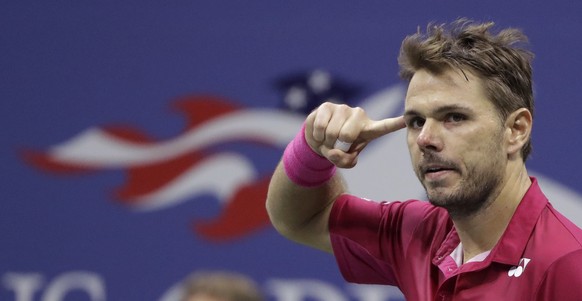 Stan Wawrinka, of Switzerland, reacts after a point to Novak Djokovic, of Serbia, during the men&#039;s singles final of the U.S. Open tennis tournament, Sunday, Sept. 11, 2016, in New York. (AP Photo ...