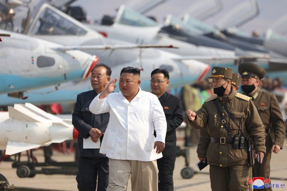 epa08374707 A photo released by the official North Korean Central News Agency (KCNA) shows North Korean leader Kim Jong Un inspecting an air defense unit in western area, North Korea, 12 April 2020. S ...