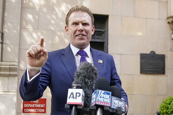 Andrew Giuliani, son of former New York Mayor Rudy Giuliani, speaks to reporters outside the building where his father lives, Wednesday, April 28, 2021, in New York. Federal agents raided Rudy Giulian ...