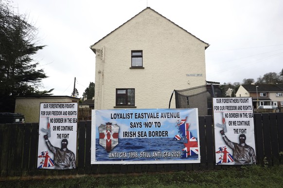 A Loyalist sign about the Irish Sea border is seen in Dungannon, Northern Ireland, Monday, Feb. 15, 2021. Since Britain left the EU