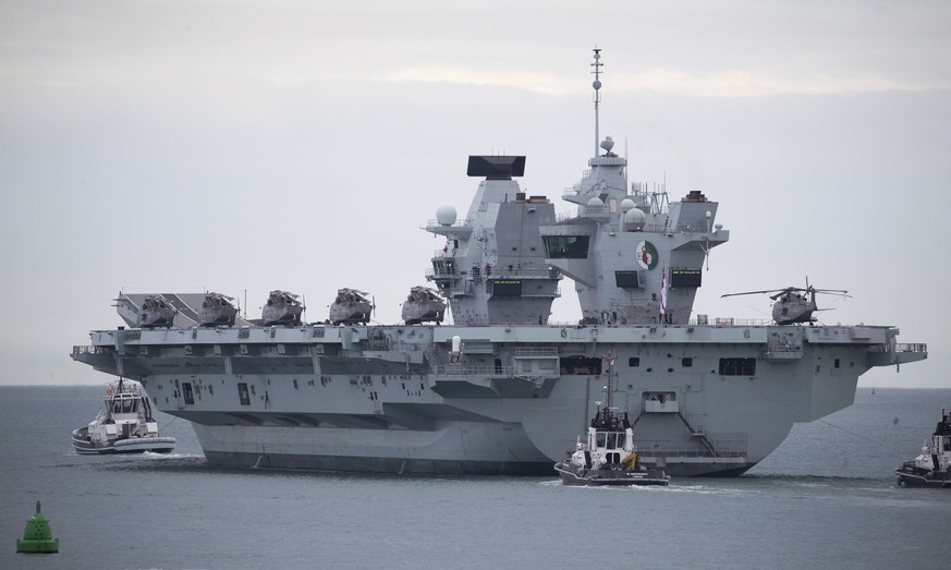 The British Royal Navy aircraft carrier HMS Queen Elizabeth leaves Portsmouth Naval Base as it sets sail for flight trials, Wednesday Sept. 9, 2020. The departure comes following two days of delays ca ...