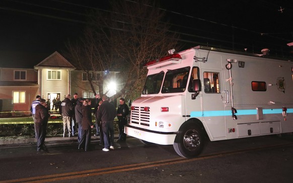 Police work the scene of a residence in Monsey, N.Y., early Sunday, Dec. 29, 2019, following a stabbing Saturday during a Hanukkah celebration. Authorities say that several people were stabbed north o ...