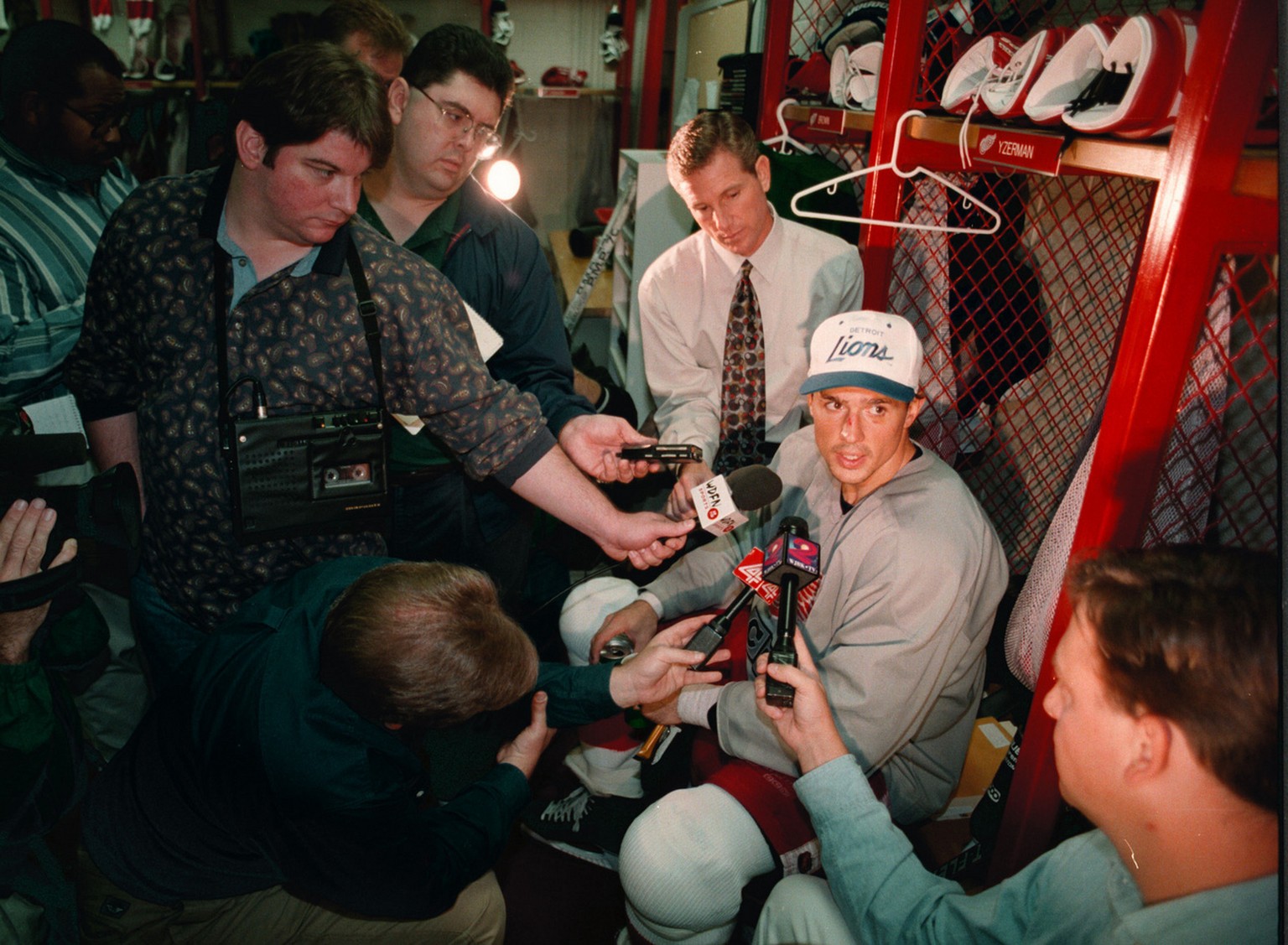 Detroit Red Wings captain Steve Yzerman sits at his locker after practice and responds to rumors that he will soon be traded from the Red Wings in this Oct. 11, 1995, photo. Yzerman, the Red Wings&#03 ...