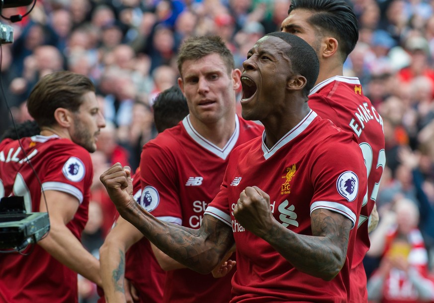 epa05978966 Liverpool’s Georginio Wijnaldum celebrates scoring the 1-0 opening goal during the English Premier League soccer match between Liverpool and Middlesbrough held at the Anfield in Liverpool, ...