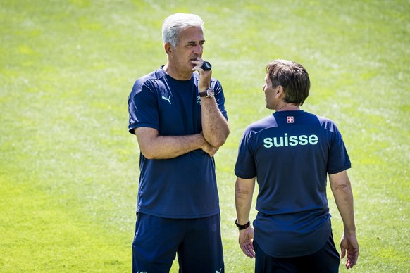 Switzerland&#039;s head coach Vladimir Petkovic, left, and Swiss assistant coach Antonio Manicone, right, react during a training session for the Euro 2020 soccer tournament at the Tre Fontane sports  ...