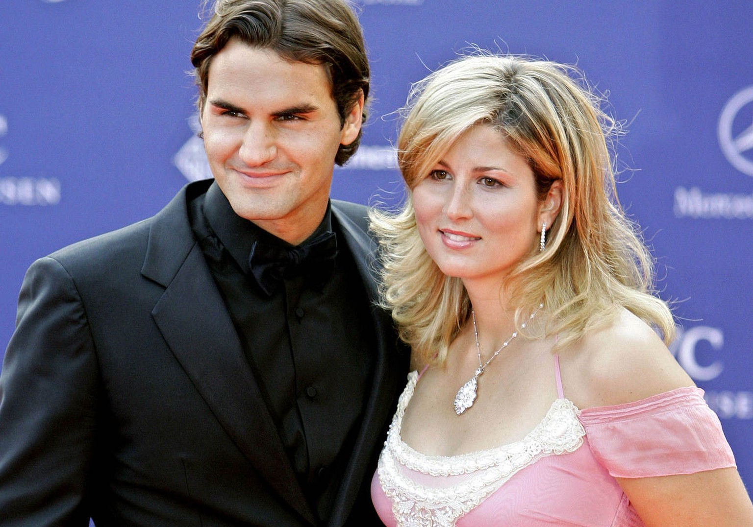 In this Monday May 22, 2006 photo Swiss tennis player Roger Federer and his partner Mirka Vavrinec pose for photographers as they arrive for the Laureus World Sports Awards in Barcelona, Spain. Federe ...