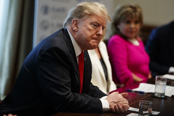 President Donald Trump listens during an event on human trafficking in the Cabinet Room of the White House, Friday, Feb. 1, 2019, in Washington. (AP Photo/ Evan Vucci)