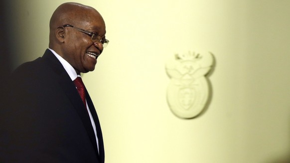 South African President Jacob Zuma leaves after addressing the the nation and the press at the government&#039;s Union Buildings in Pretoria, South Africa, Wednesday, Feb. 14, 2018. Zuma resigned on W ...