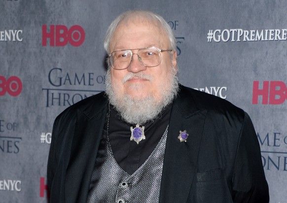 FILE - In this March 18, 2014 file photo, author and co-executive producer George R. R. Martin attends HBO&#039;s &quot;Game of Thrones&quot; fourth season premiere in New York.The &quot;Game of Thron ...