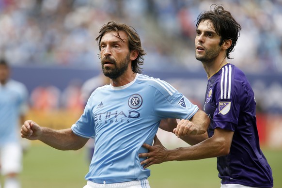 New York City FC&#039;s Andrea Pirlo, left, of Italy, battles for position against Orlando City SC&#039;s Kaka, of Brazil, during the second half of an MLS soccer game at Yankee Stadium, Sunday, July  ...