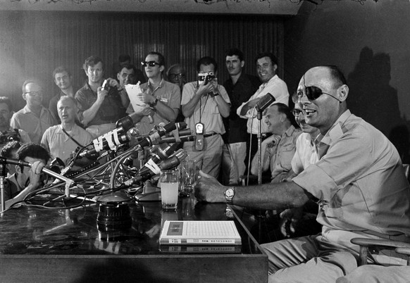Gen. Moshe Dayan talks to newsmen in Tel Aviv as he holds his first press conference, June 3, 1967, after taking the post of Minister of Defense. (AP Photo)
