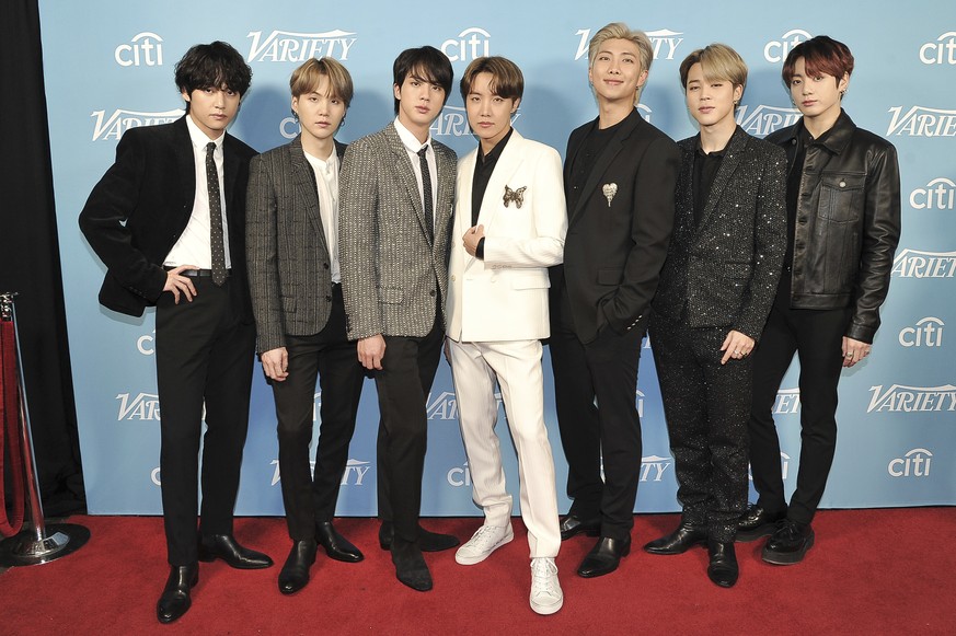 FILE - BTS attends the 2019 Variety&#039;s Hitmakers Brunch at Soho House in West Hollywood, Calif. on Dec. 7, 2019. Time magazine named the South Korean group its 2020 Entertainer of the Year. (Photo ...