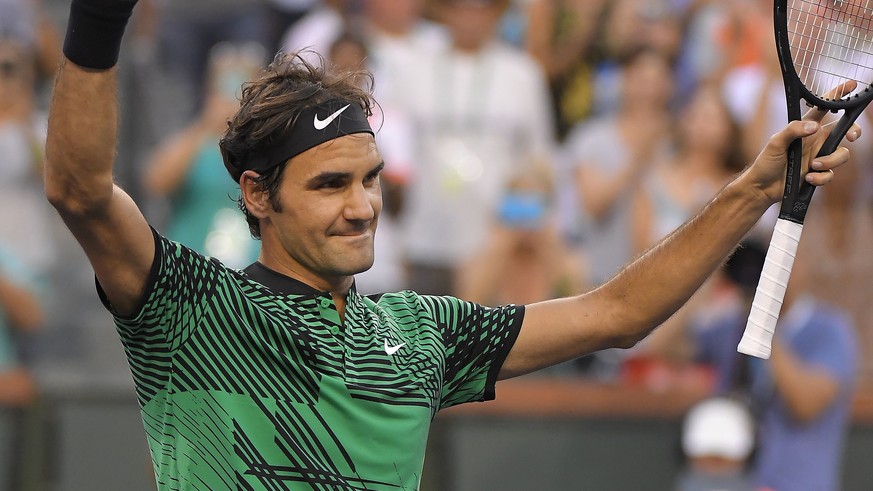 Roger Federer, of Switzerland, celebrates after beating Rafael Nadal, of Spain, at the BNP Paribas Open tennis tournament, Wednesday, March 15, 2017, in Indian Wells, Calif. (AP Photo/Mark J. Terrill)