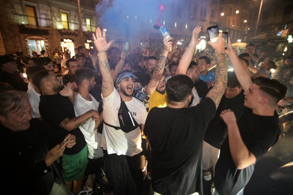 Napoli fans celebrate their team&#039;s win over Juventus in the Italian Cup soccer final against Juventus, in Naples, Italy, Wednesday, June 17, 2020. Napoli won the Italian Cup with a 4-2 penalty sh ...